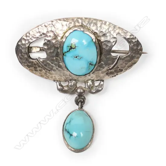 An uncommon N.Z. Reuben Watts (1869-1940) silver and turquoise brooch,